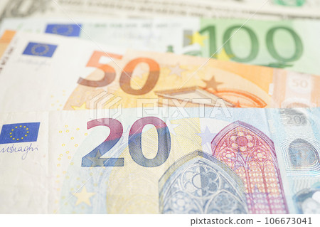 Euro and US dollar banknote cash money, finance economic banking business exchange market concept. Euro and US dollar banknote cash money, finance economic banking business exchange market concept. 106673041