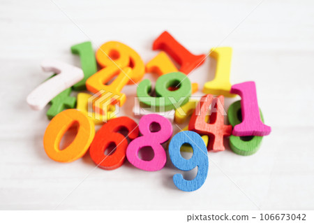 Number wood block cubes for learning Mathematic, education math concept. 106673042