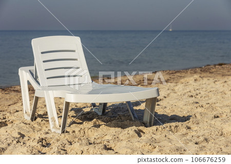 white plastic beach chair white plastic beach chair 106676259
