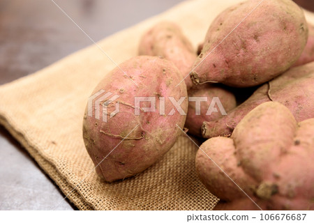 Anno sweet potato placed on a jute bag Anno sweet potato placed on a jute bag 106676687