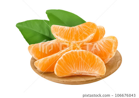 Tangerine or clementine slices in wooden bowl isolated on white background with full depth of field. 106676843