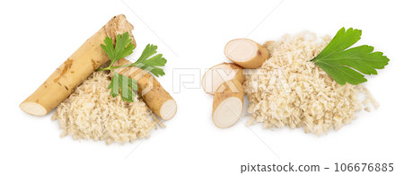 Horseradish root with slices grated pile and parsley isolated on white background Horseradish root with slices grated pile and parsley isolated on white background 106676885