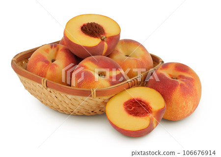 Ripe peach fruit with half in a wicker basket isolated on white background with full depth of field 106676914