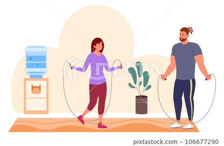 Woman jumping with skipping rope in gym interior Woman jumping with skipping rope in gym interior 106677290