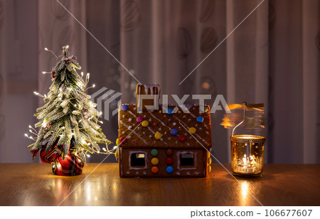 christmas decoration ginger bread house and fir tree christmas decoration ginger bread house and fir tree 106677607