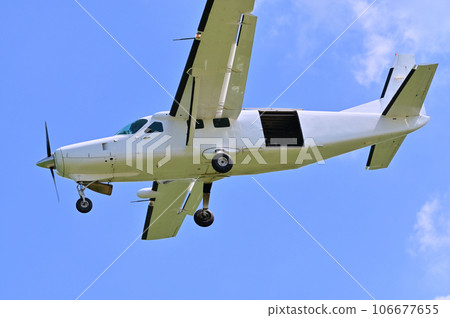 Light aircraft flying in the sky Light aircraft flying in the sky 106677655