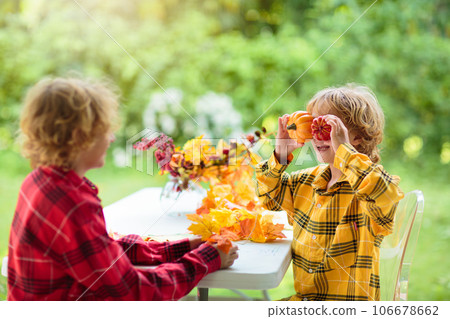 Autumn home decoration. Family decorating house. 106678662
