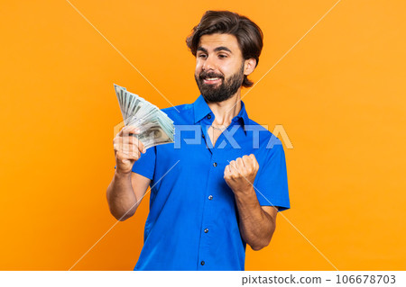 Rich pleased boss man waving money dollar cash, success business career, lottery winner big income Rich pleased boss man waving money dollar cash, success business career, lottery winner big income 106678703