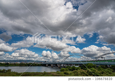 Osaka monorail iron bridge and Torikai Bridge over Yodo River Osaka monorail iron bridge and Torikai Bridge over Yodo River 106678810