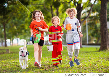 Kids trick or treat. Halloween fun for children. 106678845