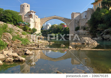 Stari Most, a world cultural heritage bridge spanning the Neretva River in Mostar, Bosnia and Herzegovina, southern Europe, and the water mirror on the river surface Stari Most, a world cultural heritage bridge spanning the Neretva River in Mostar, Bosnia and Herzegovina, southern Europe, and the water mirror on the river surface 106679185