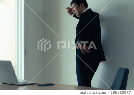 An agonizing businessman An agonizing businessman 106680977