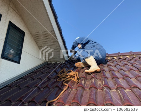 Roof repair Exterior work Craftsman at construction site Roof repair Exterior work Craftsman at construction site 106682639
