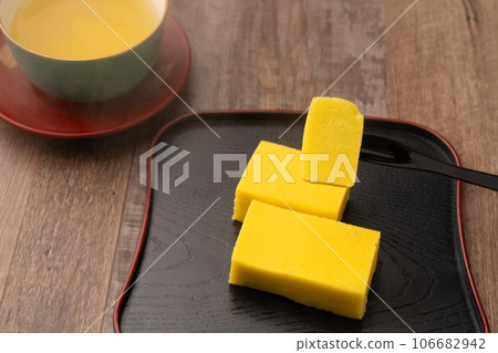 Sweet potato yokan with chopsticks Sweet potato yokan with chopsticks 106682942