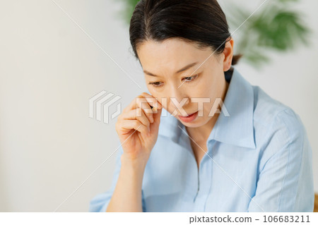 Woman living room writing worried 106683211