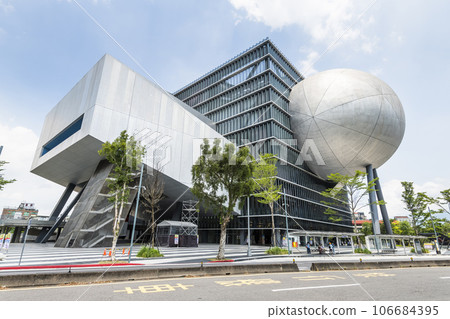 Building view of the Taipei Performing Arts Center in Taiwan. it's a modern building combining cube and sphere geometry. Building view of the Taipei Performing Arts Center in Taiwan. it's a modern building combining cube and sphere geometry. 106684395