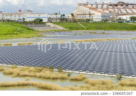 View of the floating Solar power system on the flood detention basin in Kaohsiung, Taiwan. View of the floating Solar power system on the flood detention basin in Kaohsiung, Taiwan. 106685167