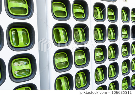 Taiwanese Gogoro electric vehicle company's swappable batteries and charging infrastructure. Batteries charging station for scooter bike motorcycles. 106685511