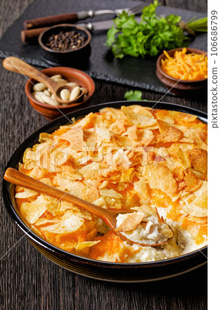 creamy cheesy chicken almond casserole, top view creamy cheesy chicken almond casserole, top view 106686799
