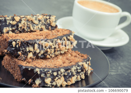 Fresh pastry made of zucchini and cup of coffee. Delicious dessert Fresh pastry made of zucchini and cup of coffee. Delicious dessert 106690079
