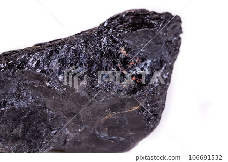 Macro mineral stone sorrel - black tourmaline on white background 106691532