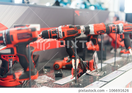 Tool for work, repair and construction in store. Wired power tools and battery powered equipment 106691626