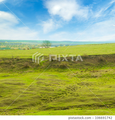 Green field and soil erosion (land slide). Green field and soil erosion (land slide). 106691742