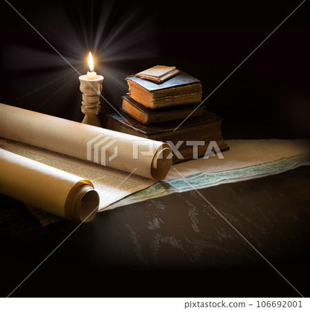 Still life from ancient books with candles Still life from ancient books with candles 106692001