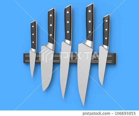 Set of chef's kitchen knives and kitchen utensil hanging on shelf 106693855