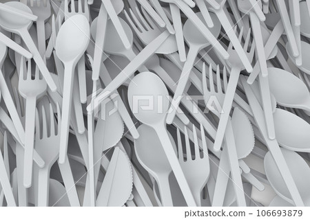 Heap of disposable utensils like spoon, fork and knife on white background. 106693879