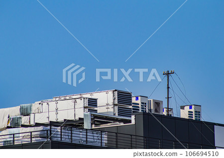 Industrial air conditioning and ventilation system on the roof of the building. 106694510