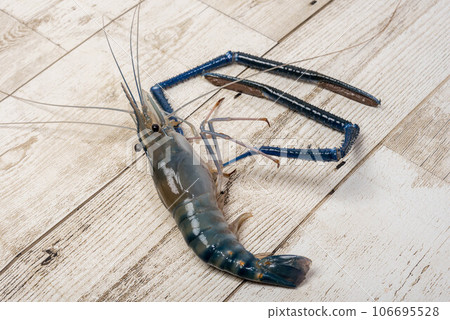 Fresh shrimp on wooden background. Seafood 106695528