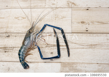 Fresh shrimp on wooden background. Seafood 106695530