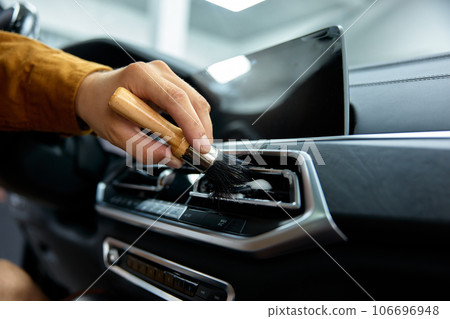Closeup dashboard washing, car detailing and dry cleaning service 106696948