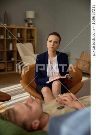 Anxious male soldier treatment with psychotherapeutic hypnosis 106697215