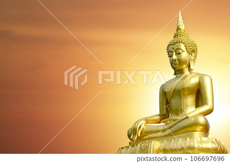 Magha Asanha Visakha Puja Day , Silhouette Buddha on golden sunset background. 106697696