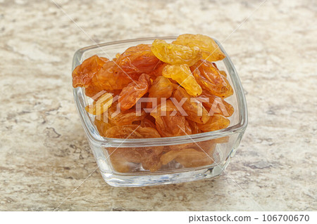 Sweet yellow raisin in the bowl Sweet yellow raisin in the bowl 106700670