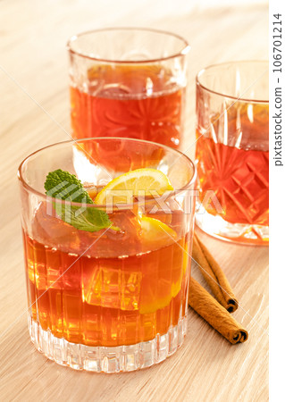 iced tea with lemon and ice in a glass iced tea with lemon and ice in a glass 106701214