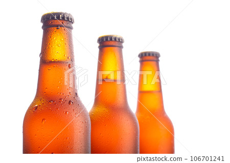 Fresh beers bottles on white background Fresh beers bottles on white background 106701241