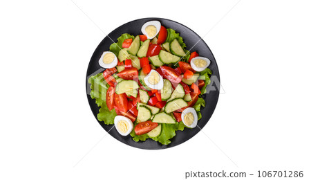 Lettuce, cucumber, spinach, tomato and quail eggs salad with herbs and lemon Lettuce, cucumber, spinach, tomato and quail eggs salad with herbs and lemon 106701286