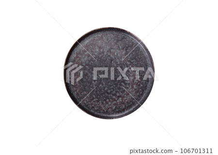 Black plate on a black background. Flat lay, top view, copy space Black plate on a black background. Flat lay, top view, copy space 106701311