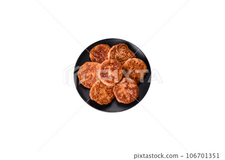 Fried cutlets from minced meat in frying pan and spices  106701351