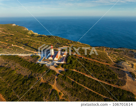 Aerial drone view of lighthouse on Cabo Espichel cape Espichel on Atlantic ocean Aerial drone view of lighthouse on Cabo Espichel cape Espichel on Atlantic ocean 106701614