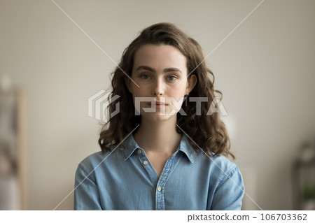 Serious beautiful young adult girl head shot portrait Serious beautiful young adult girl head shot portrait 106703362