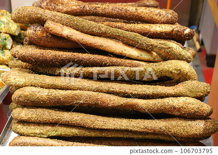 bread and bakery products are sold in a store in Israel. bread and bakery products are sold in a store in Israel. 106703795