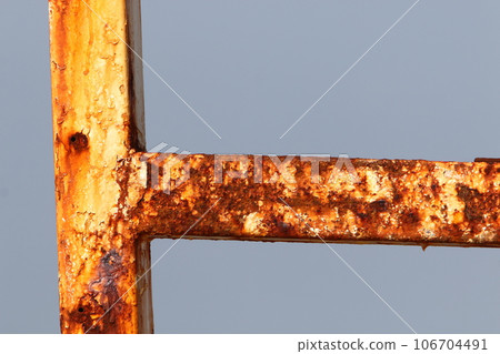 Old and rusty iron and products are covered with rust. 106704491