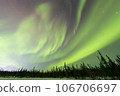 Aurora spreads across the starry sky of Yellowknife 106706697