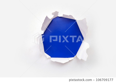 Big paper hole in the middle of color background. Blank space to insert your advertising content promotion or text information. Concept for your advertising promotion. Big paper hole in the middle of color background. Blank space to insert your advertising content promotion or text information. Concept for your advertising promotion. 106709177