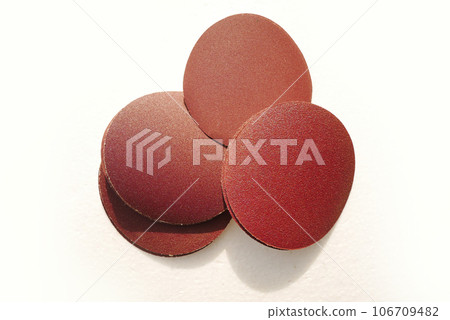 Close up round sandpaper isolated on white background 106709482