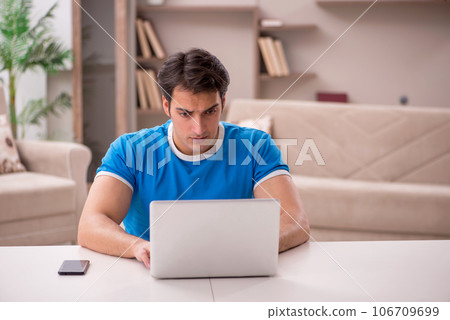 Young man freelancer working from home Young man freelancer working from home 106709699